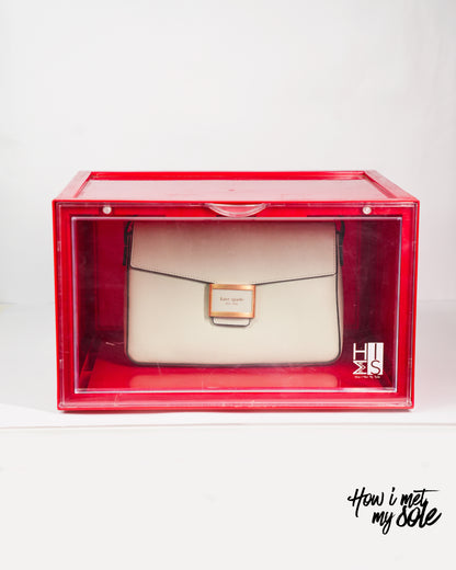 White luxury handbag in a red style safe storage box with 'How i met my sole' branding